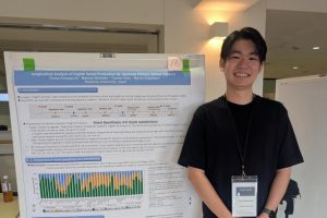 Hiroto Kawaguchi presenting a poster at ISAPh 2026.